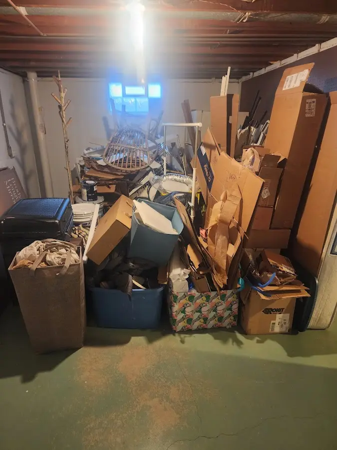 Roll-off dumpster container at job site for 6 Yard Dumpster Rental in Paris